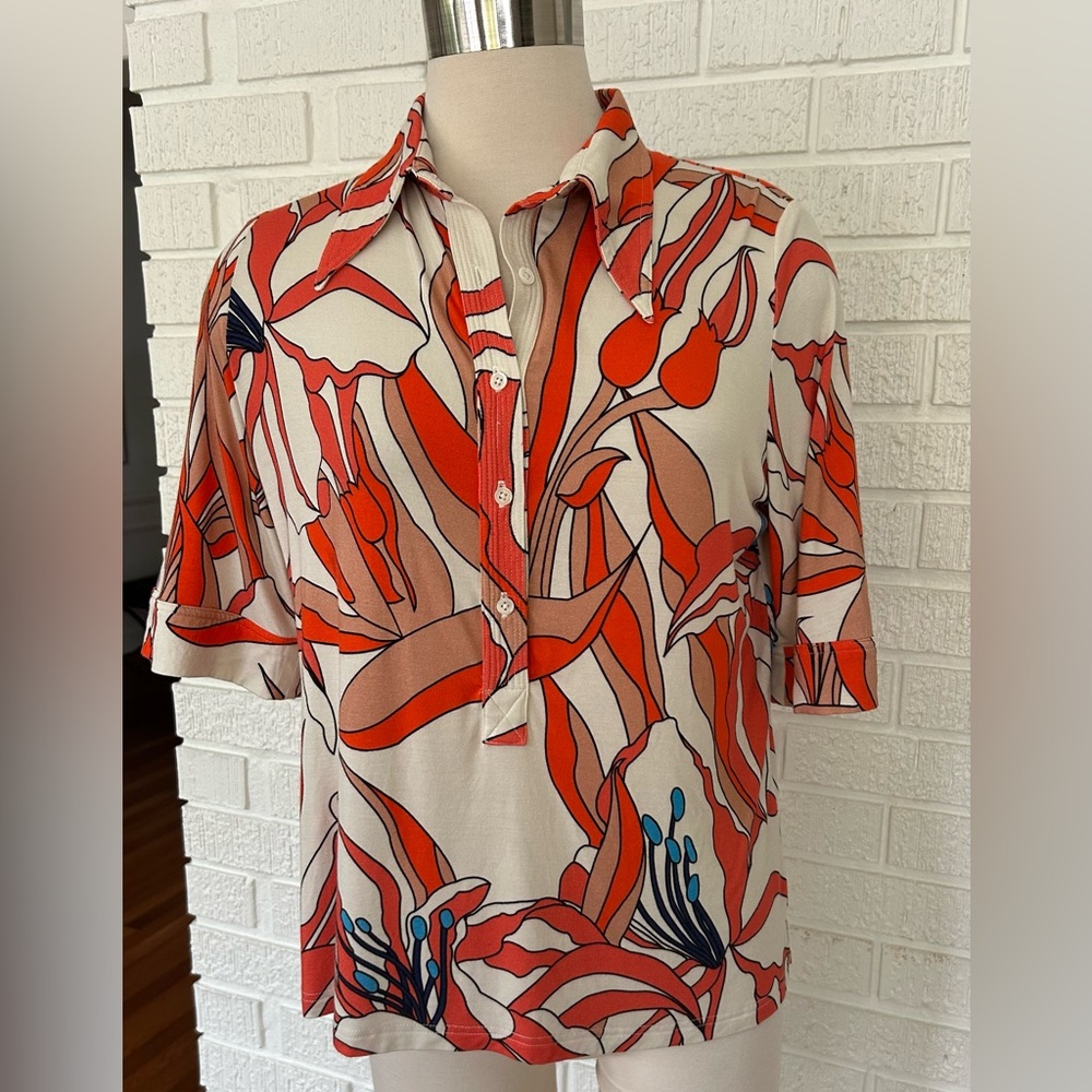 LA PRESTIC OUISTON - Lauren polo in large geometric orange  floral print.